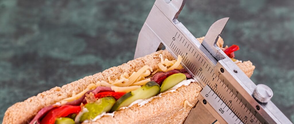 vernier caliper measuring a sandwich