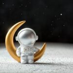 The figure of an astronaut siting on the moon feeling the gravity.