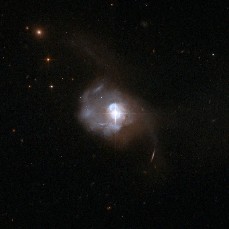 Quasars are the most luminous type of active galaxy. They emit light across the electromagnetic spectrum, produce powerful particle jets, and can radiate thousands of times the energy emitted by a galaxy like the Milky Way. The nearest quasar, called Markarian 231, is located some 600 million light-years away, but we see many more quasars the farther we look.